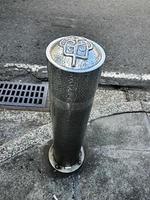 Pedestrian facilities on the Malioboro sidewalks include steel pipe bollards with traditional ornaments or motifs photo