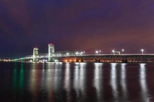 Marine Parkway-Gil Hodges Memorial Bridge as seen from Rockaway, Queens at night. Built and opened in 1937, it was the longest vertical-lift span in the world for automobiles. photo