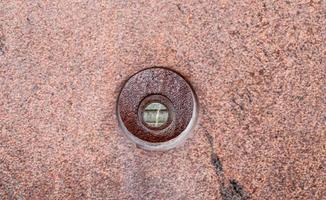 Close up view at a granite and stone wall texture in a high resolution. photo