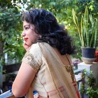 Beautiful woman dressed up as Indian tradition with henna mehndi design on her both hands to celebrate big festival of Karwa Chauth, Karwa Chauth celebrations by Indian woman for her husband photo