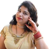 Beautiful woman dressed up as Indian tradition with henna mehndi design on her both hands to celebrate big festival of Karwa Chauth with plain white background photo