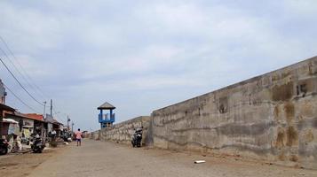 Coastal embankment retaining tidal waves photo