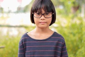 Portrait of child wearing eyeglasses photo