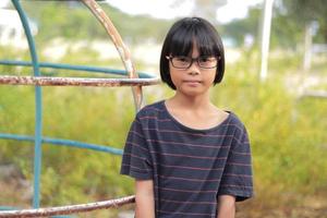 Kid wearing eyeglasses photo