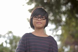 Happiness child wearing eyeglasses photo