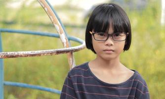 Kid wearing eyeglasses photo