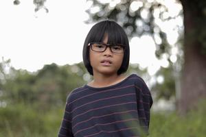 Portrait of child wearing eyeglasses photo