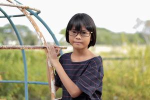 Portrait of child wearing eyeglasses photo