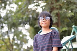 Child wearing eyeglasses photo
