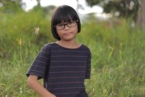 Portrait of child wearing eyeglasses photo