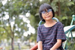 Kid wearing eyeglasses photo