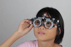 Girl eye test, test eye concept, child test eye photo
