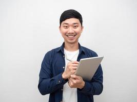 Businessman cheerful holding tablet and pen with happy smile photo