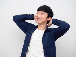 Portrait asian man feeling relax show hand at his face with happy smile photo