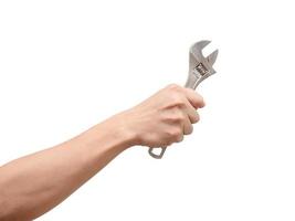 Hand holding adjustable wrench on white isolated background,Labor tool technician photo