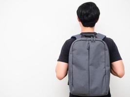 Man with school backpack stand turn back copy space white background back to school concept