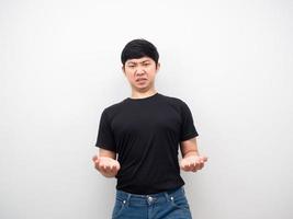 Asian man empty hand up gesture carry something copy space photo