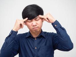 Closeup asian man touch his head feeling headache portrait photo