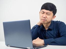 Man tried from work gesture pain neck office syndrome concept photo