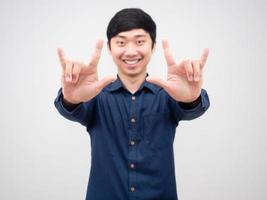 Asian man cheerful show double love hand happy smile white background photo