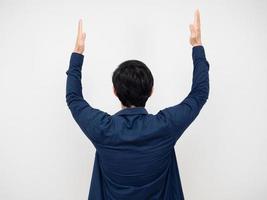 Man turn back show two hand up portrait white background photo
