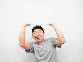 Asian man gesture carry something on his head copy space photo