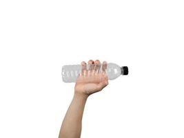 Hand holding plastic bottle white isolated,Man hand holding empty water bottle photo