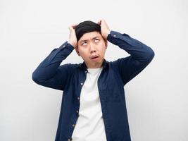 Asian man touch head feeling headache white background photo