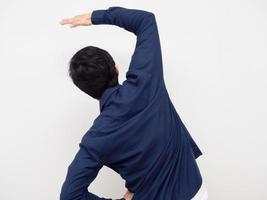 Man standing turn back gesture stretch lazily white background photo