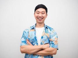 Cheerful man blue shirt happy emotion gesture cross arm and laugh photo