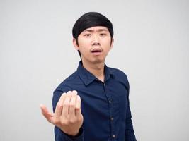 Asian man gesture beckon his hand say come on challenge concept portrait white background photo