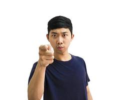 Young Asian man black shirt point right finger at you serious at face and looking camera white isolated background concept photo