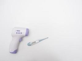 Infrared thermometer digital on white background copy space photo