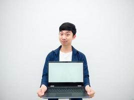 Asian young man show laptop in hand up with smile face and cheerful on white isolated background photo