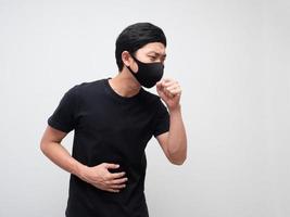 Sick man with mask black shirt cough on white isolated space photo