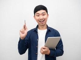 Asian man holding tablet show pen up gesture get idea photo