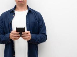 Man using mobile phone in his hand crop body with copy space white background photo