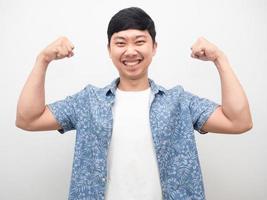 Cheerful man happy smile show muscle arm healthy concept photo