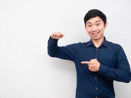 Cheerful man hand up and point finger at copy space photo