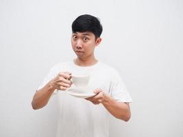 Asian man holding coffee cup invite to taste face white background photo