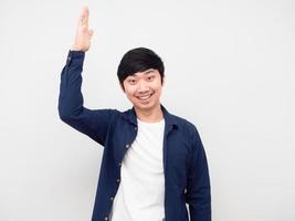 Cheerful man smile face show one hand up portrait white background photo
