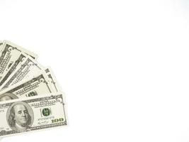 vista superior del dólar de la cuenta de dinero en el espacio de copia aislado en blanco foto