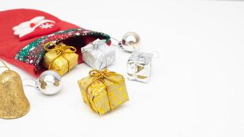 Close up christmas gift and accessories and stocking on white isolated copy space photo