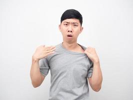 Asian man feeling weather it hot gesture swing hand white background photo