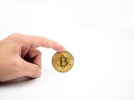 Hand catch gold bitcoin isolated copy space photo