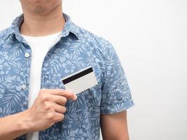 Close up man blue shirt holding credit card isolated photo