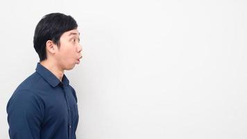 Man side view feeling amazed looking at copy space white background photo