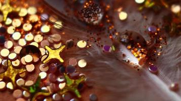 Close-up Of water drop with glitter on it in different colorful loghts in Karachi Pakistan 2022 photo