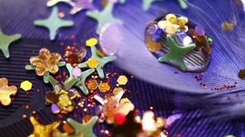 Close-up Of water drop with glitter on it in different colorful loghts in Karachi Pakistan 2022 photo