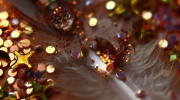 Close-up Of water drop with glitter on it in different colorful loghts in Karachi Pakistan 2022 photo